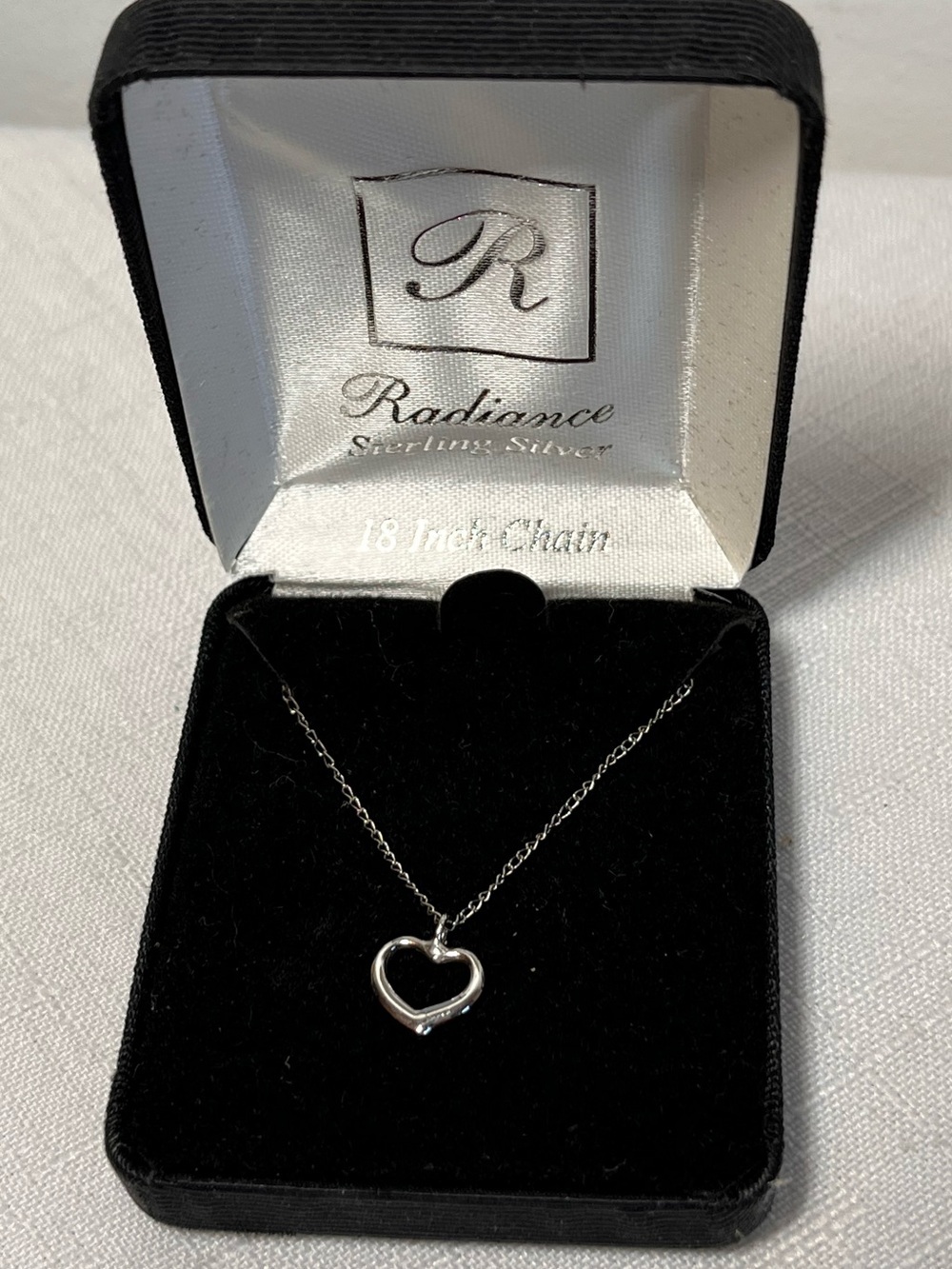 New Delicate Sterling Silver Open Heart Necklace - Silver. 18”
Great gift!